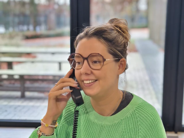 Team member having a call with a client